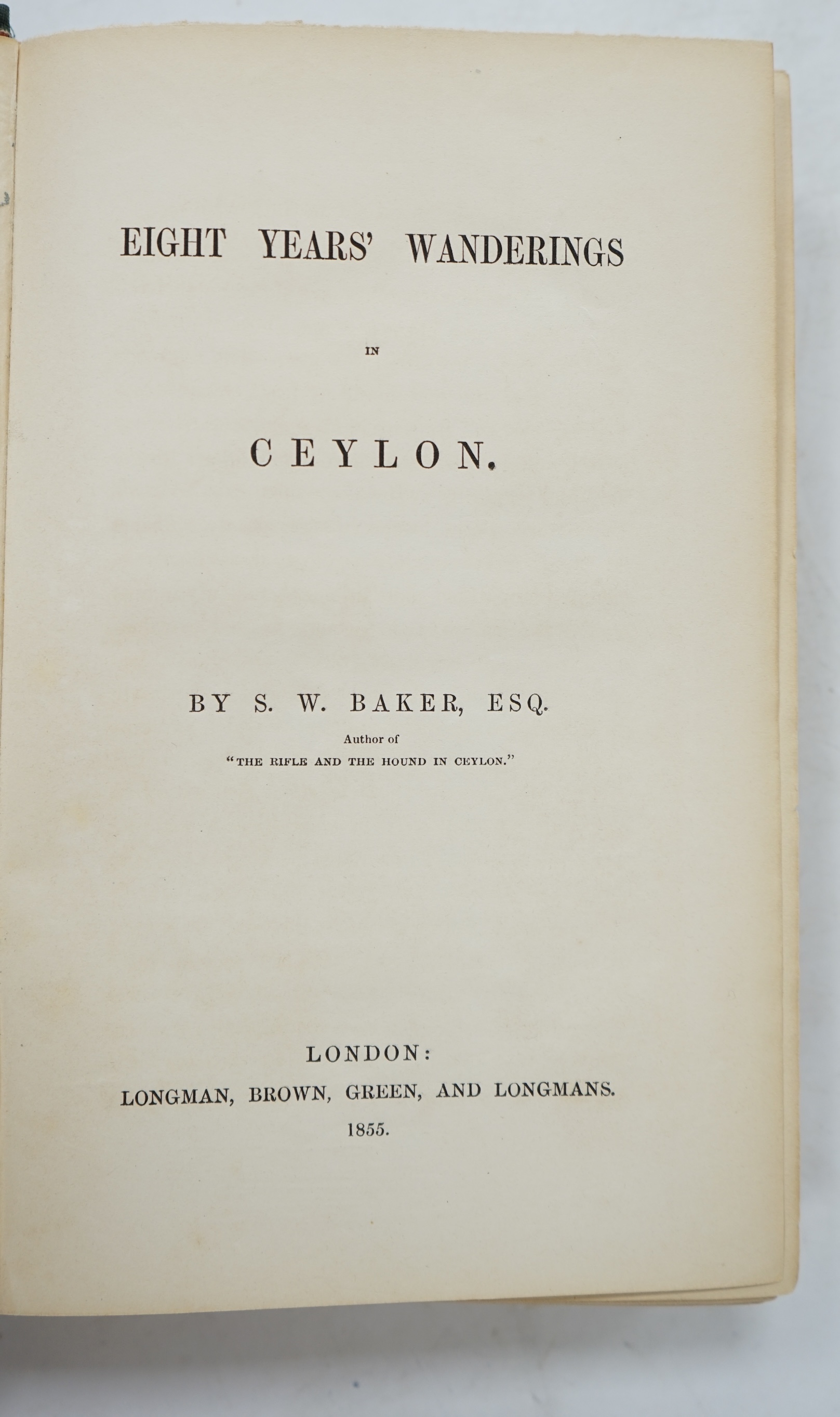 Baker, Sir Samuel White - Eight Years' Wanderings in Ceylon, 1st edition. 6 chromolithographed plates, half-title. 8vo, original gilt-blue cloth, Longman, Brown, Green and Longmans, 1855.
